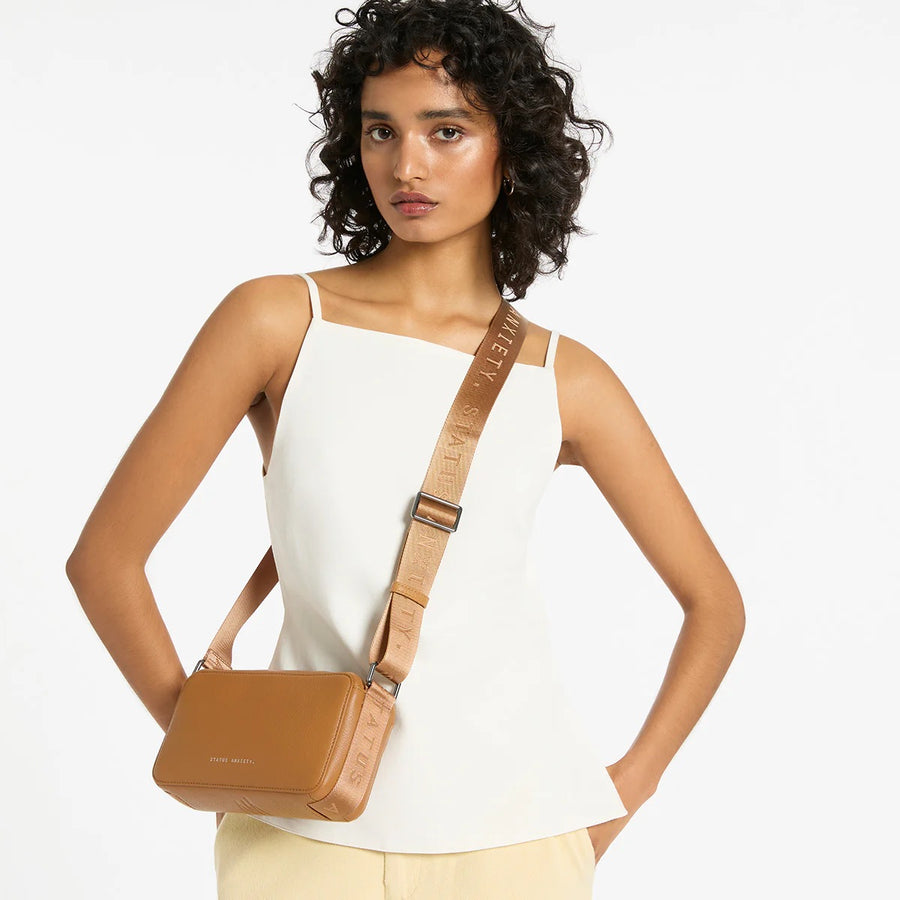 Status Anxiety II DELIRIUM Cross Body Bag - Tan