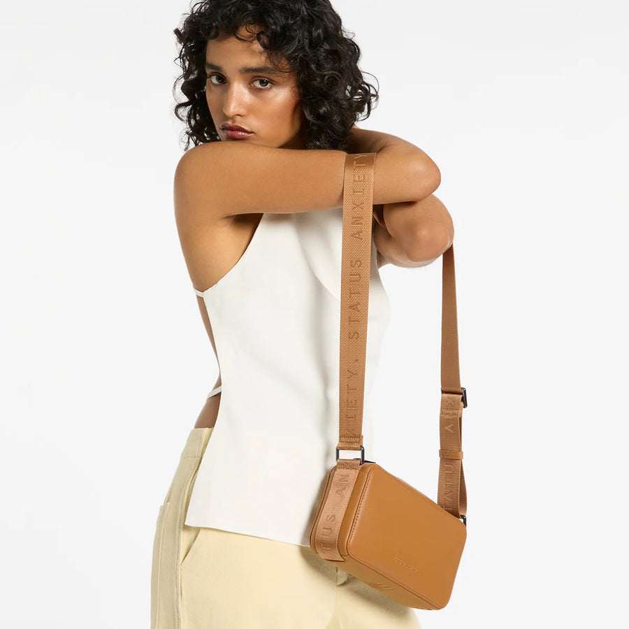 Status Anxiety II DELIRIUM Cross Body Bag - Tan
