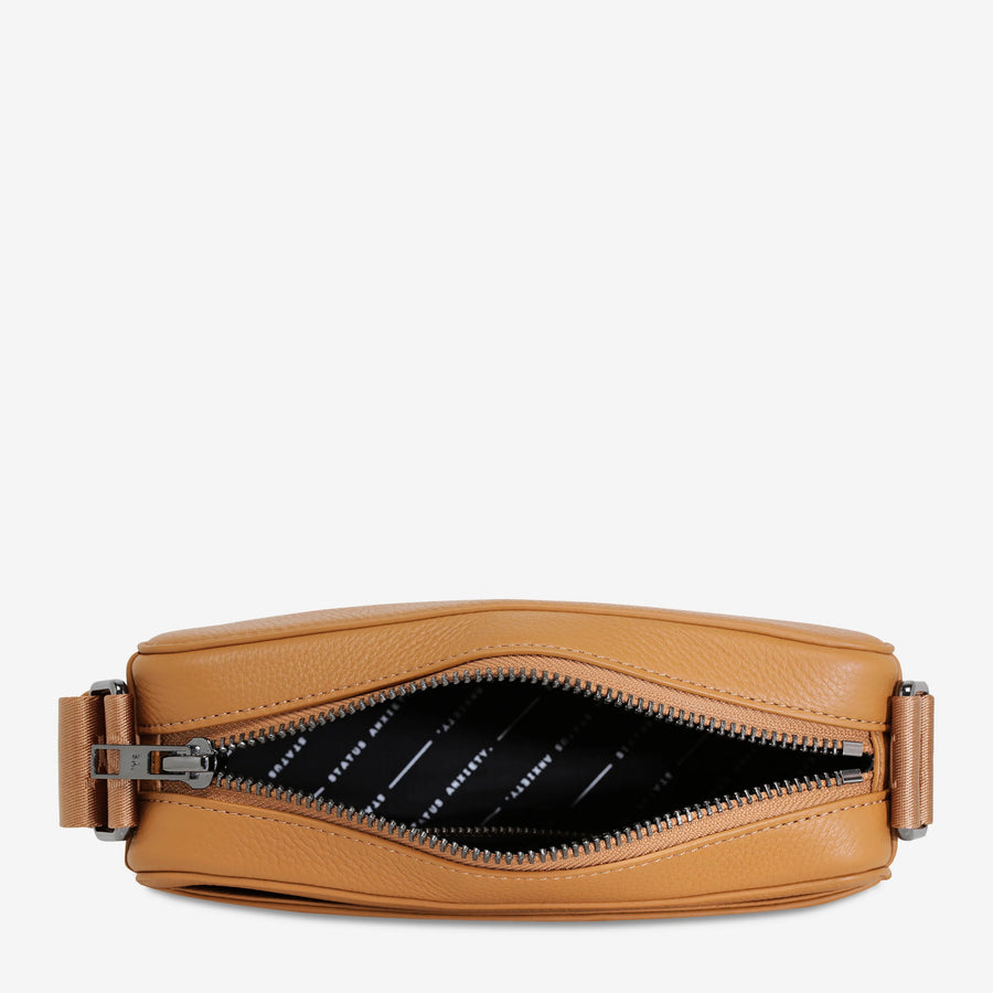 Status Anxiety II DELIRIUM Cross Body Bag - Tan
